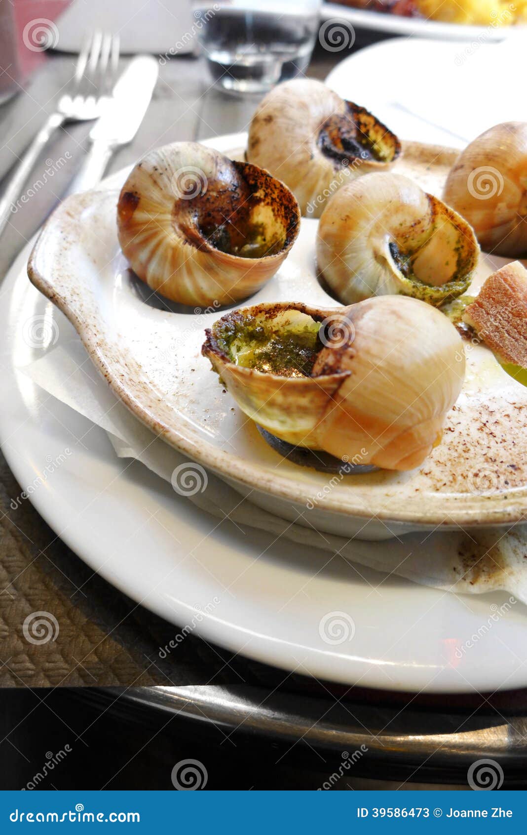 escargots snails in french restaurant cafe