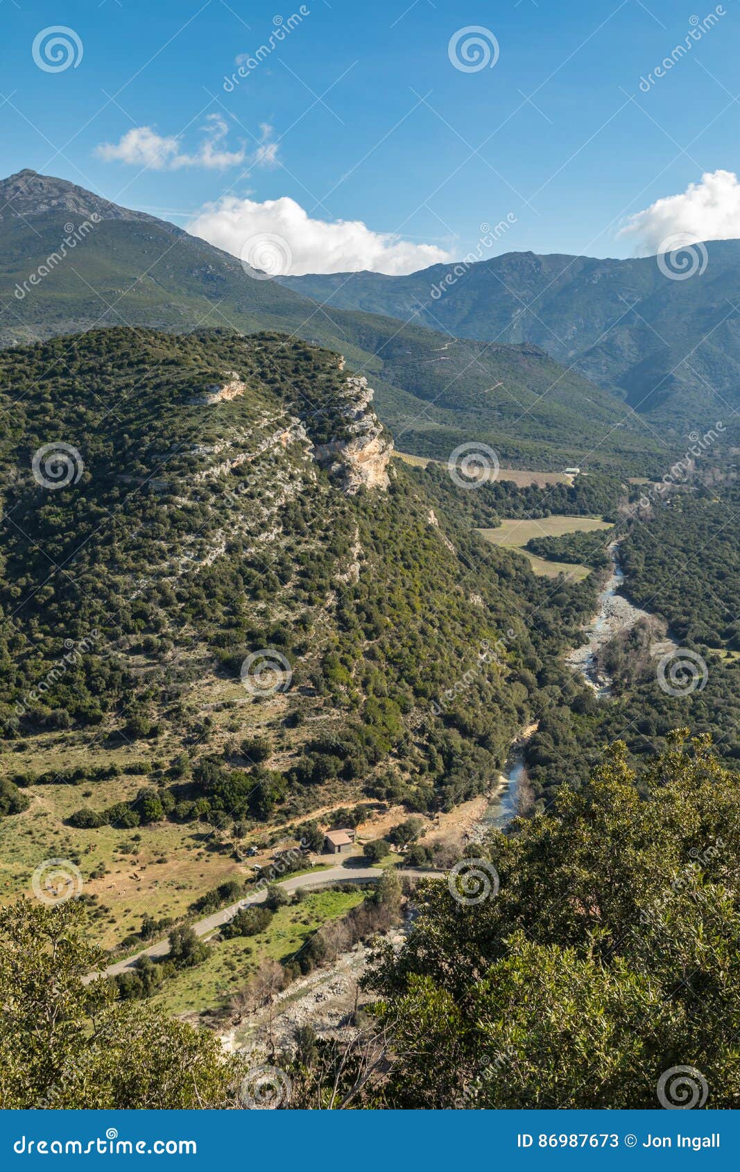 escarpment and river valley at patrimonio in corsica