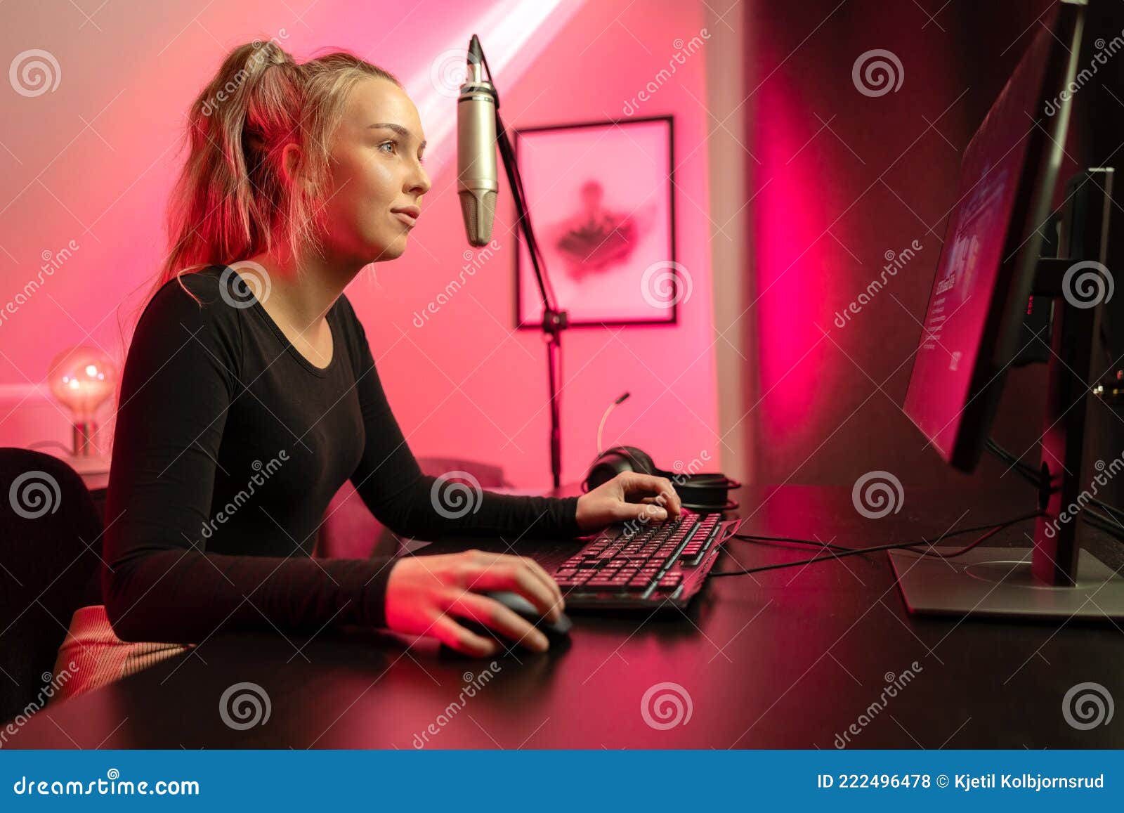 Esport Gamer Girl Streaming Vlog and Plays Online Video Game on PC Stock Photo