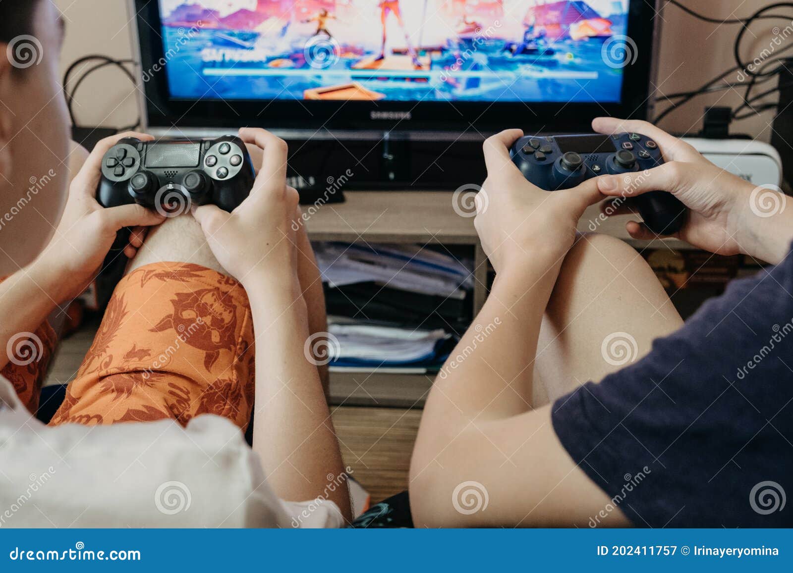 Esports, Competition, Gaming, Multiplayer, Live Streaming. Two Boys Playing  Online Video Game on Playstation. Two Editorial Photography - Image of  monitor, battle: 202411757