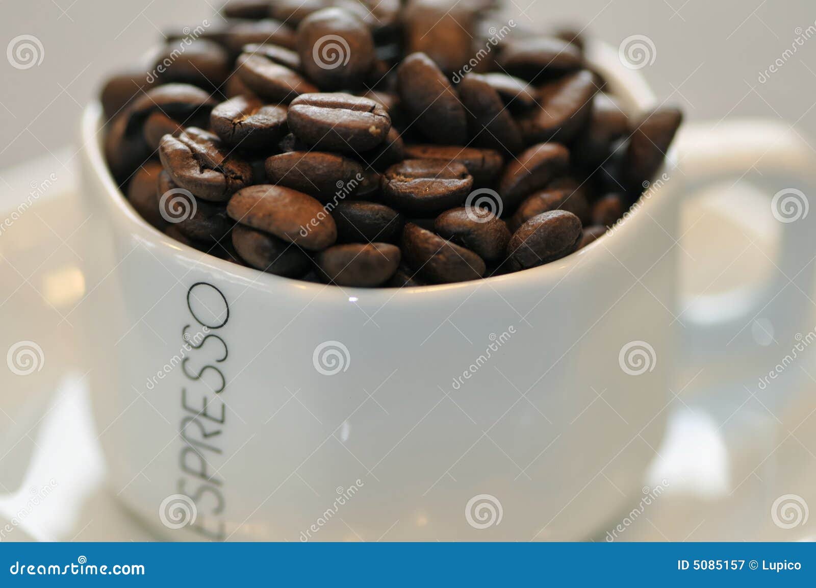 Espresso Beans in a Cup stock image. Image of french, bean 5085157