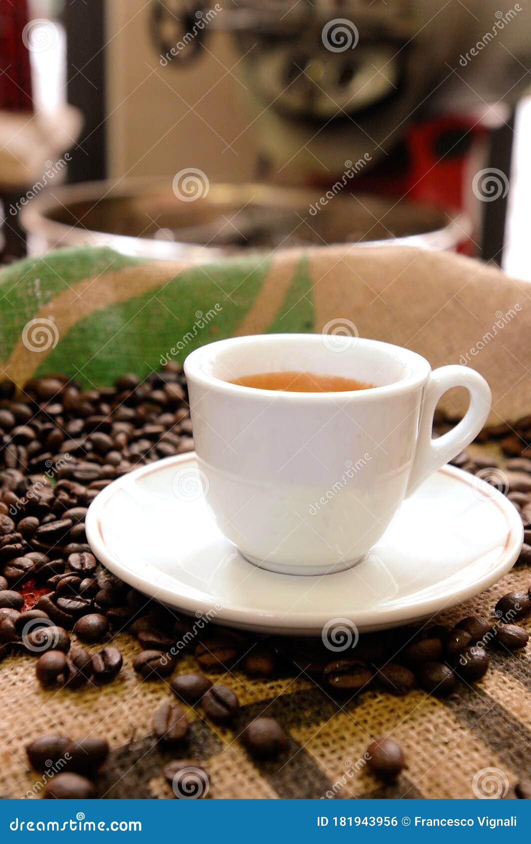 espresso cup with coffee beans in a coffee roasting