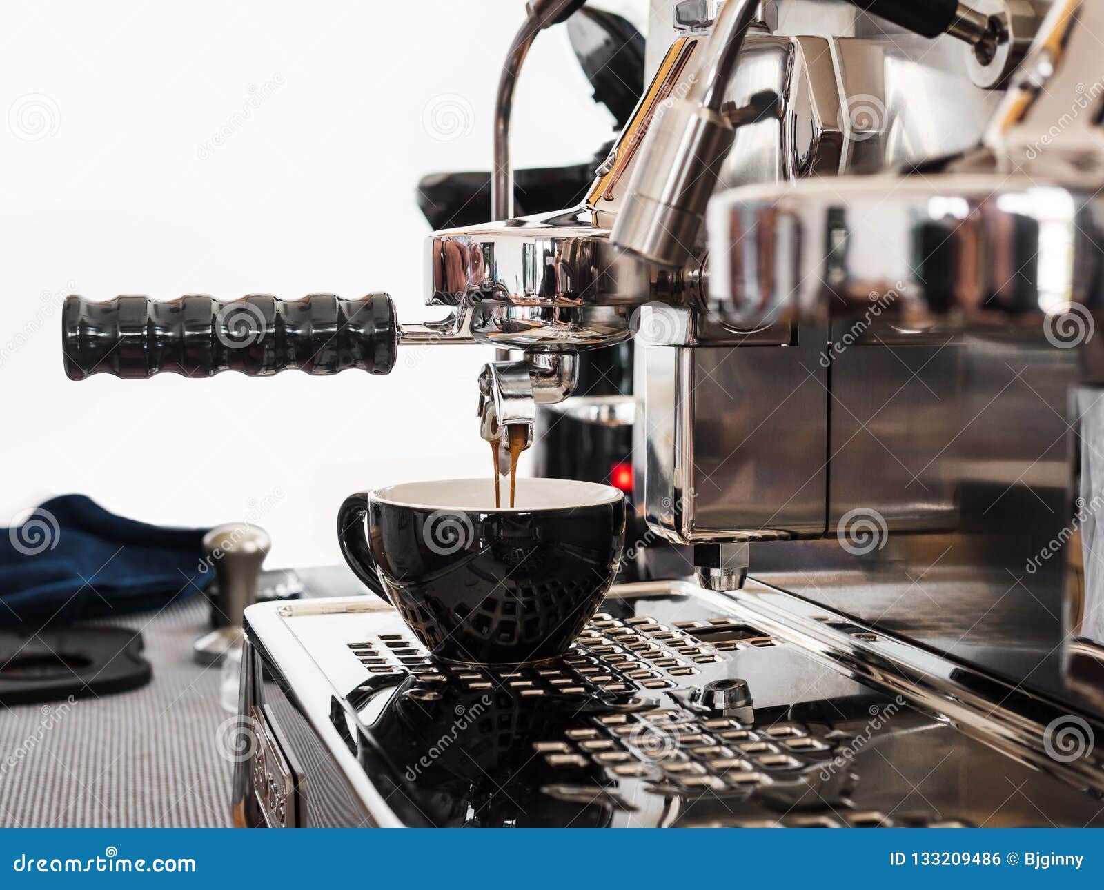 Espresso machine making coffee in coffee shop, Professional coffee brewing