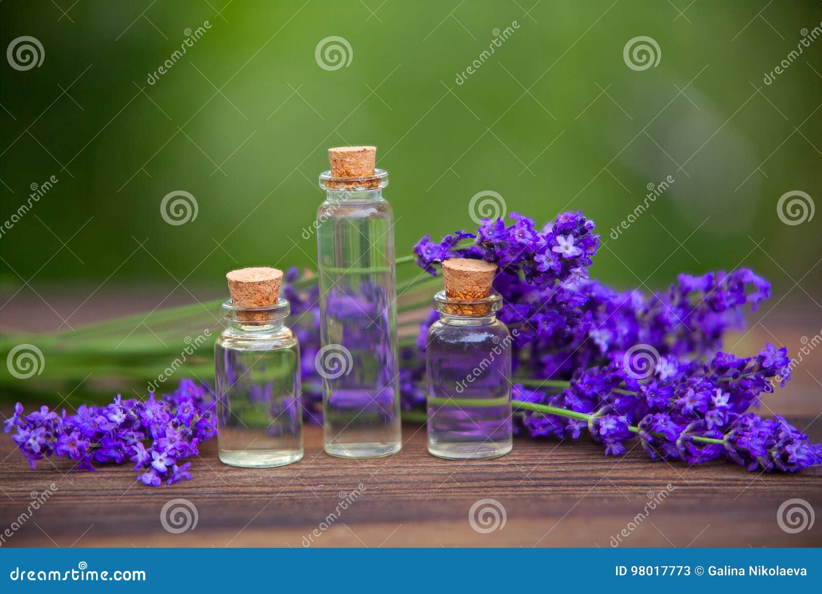 Essence of Lavender Flowers on Table in Beautiful Jar Stock Image