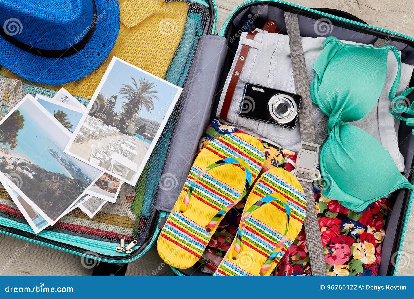 Essential Beach Things in Suitcase. Stock Photo Image of full
