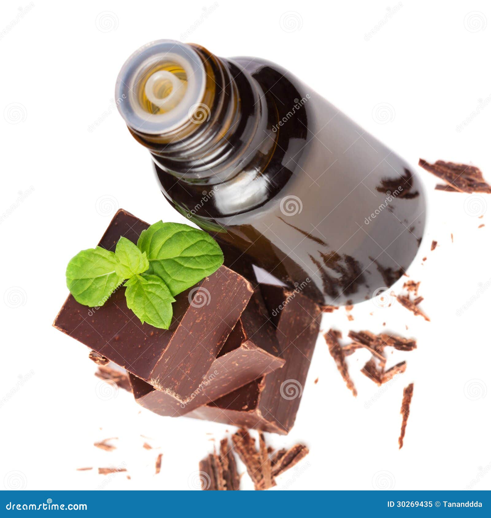 Essential Oil Essential and Chocolate with Mint Leaves Isolated