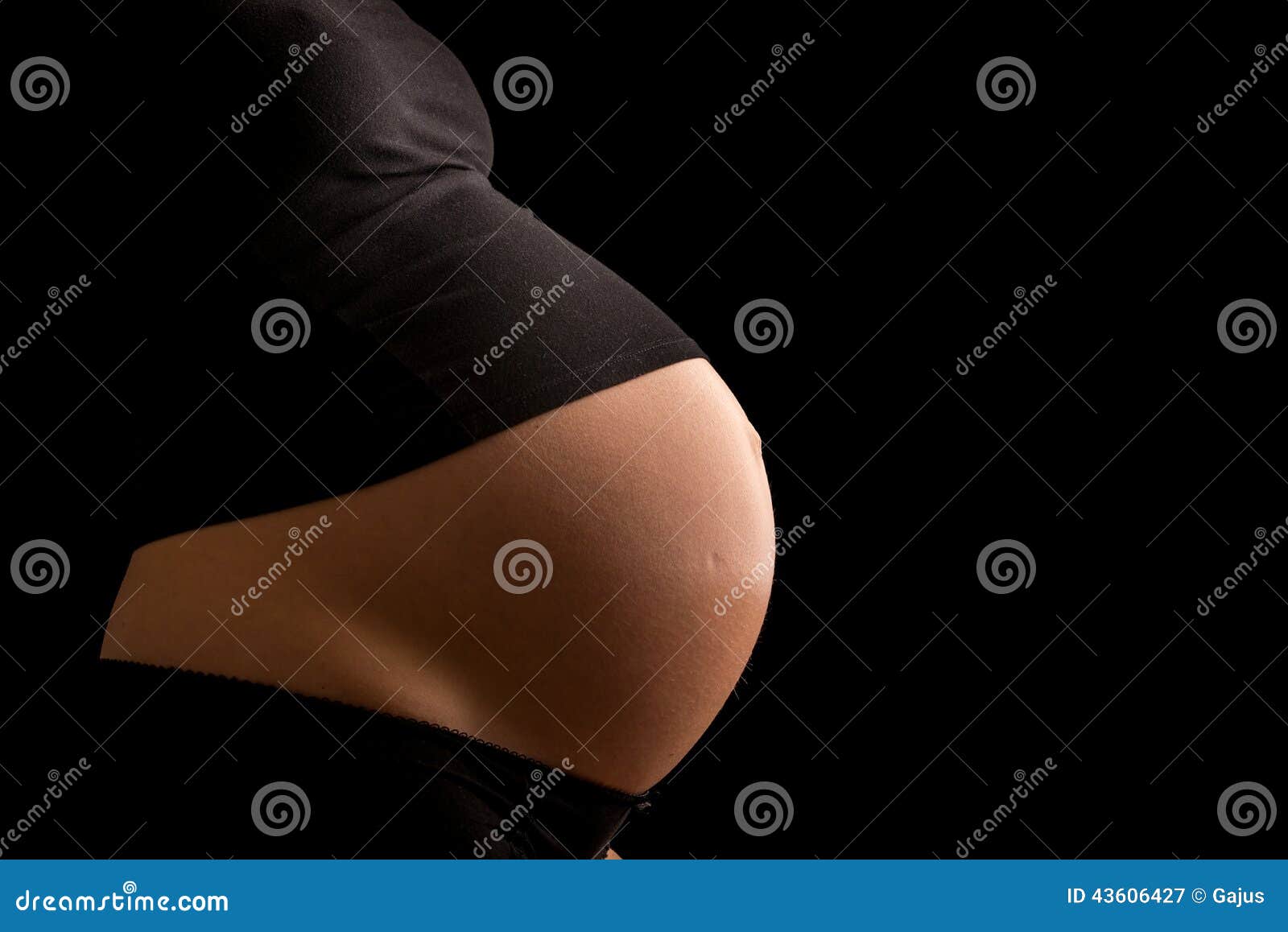 Estómago Embarazada Expuesto Imagen de archivo Imagen de paternidad