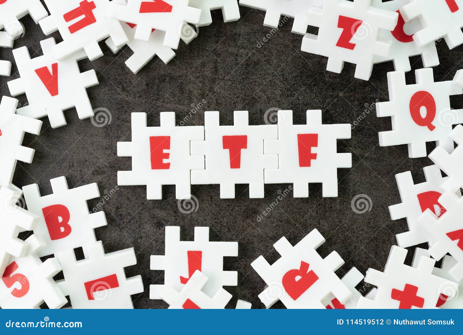 etf, exchange traded fund concept, white puzzle jigsaw with alphabet etf at the center, a type of investment fund that is traded