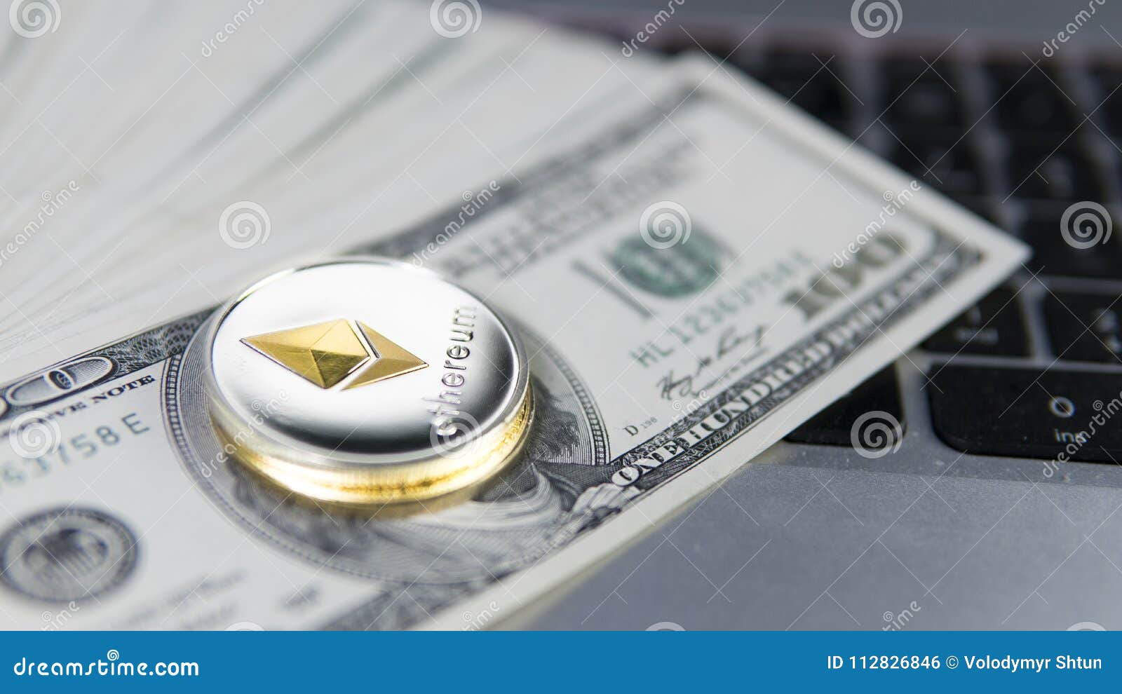 Ethereum Cryptocurrency On Top Of 100 Dollar Biils On A ...