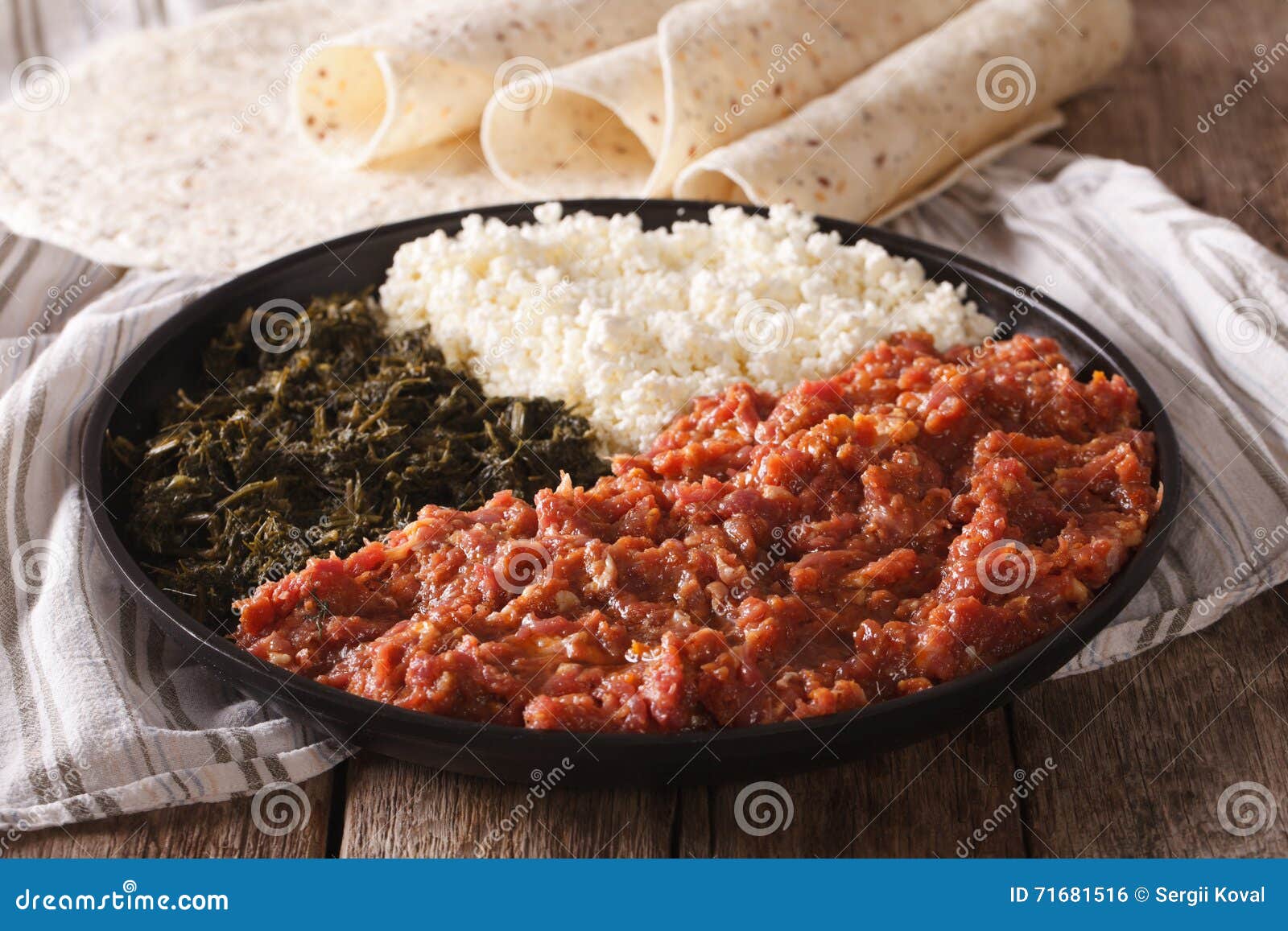 Ethiopian Food Kitfo: Marinated Beef with Herbs and Cheese Close Stock