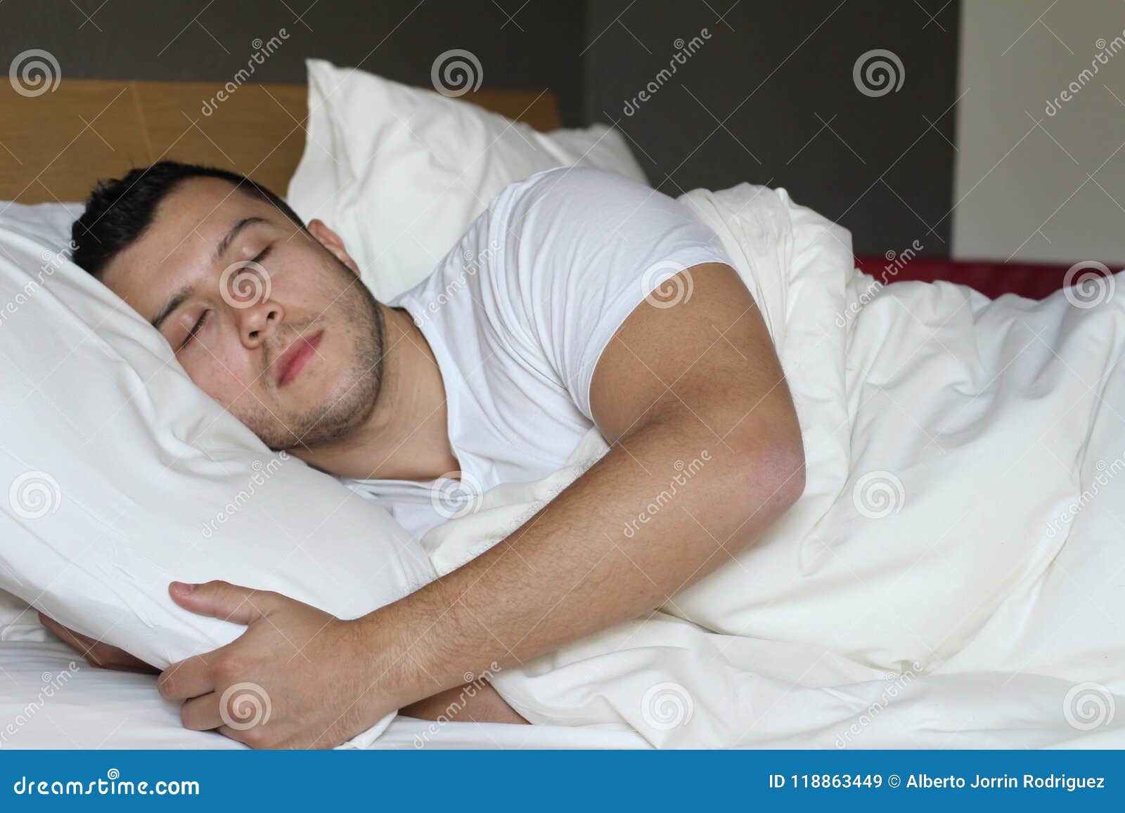ethnic male sleeping in comfortable position
