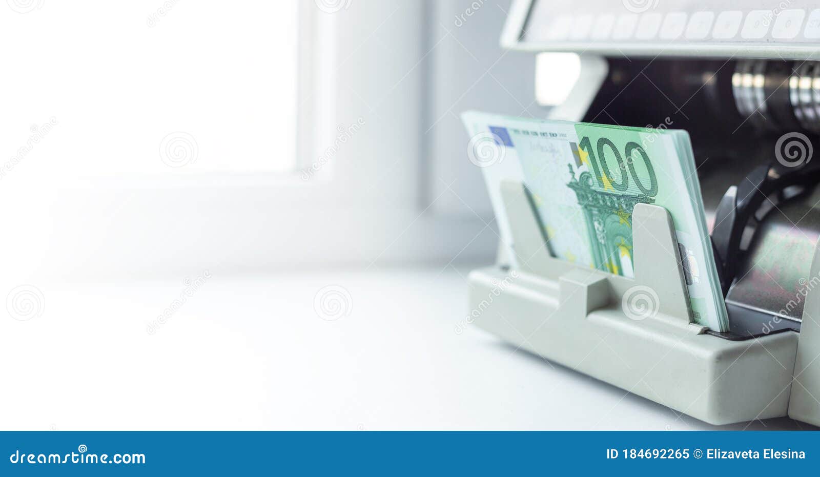 Euro EUR Banknotes of 100 on Money Counter Machine. Automatic Money
