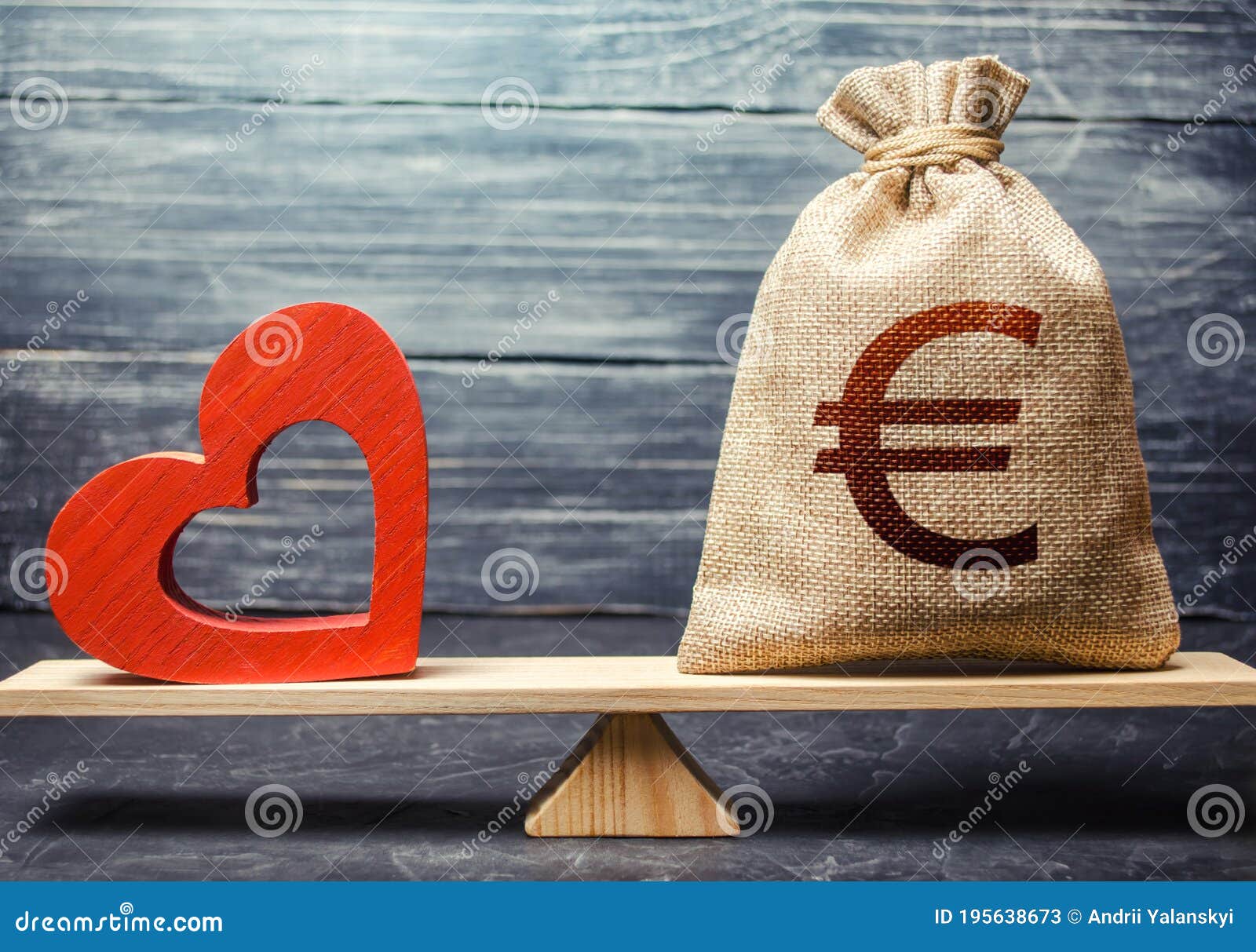 euro money bag and red heart on scales. health life insurance financing concept. subsidies. funding healthcare system. reforming