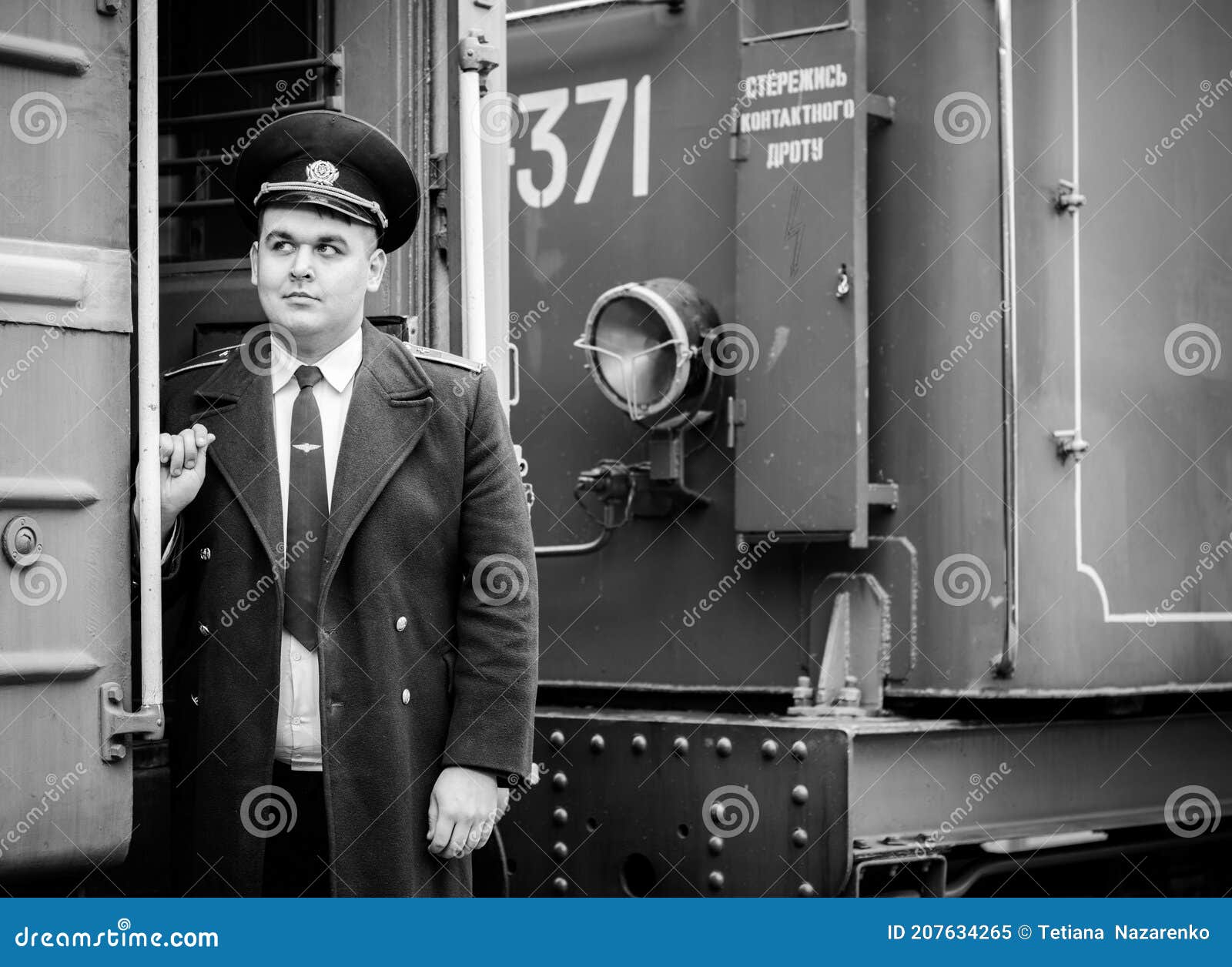 Conductor on a Railway Station Stock Image - Image of smile, conductor ...