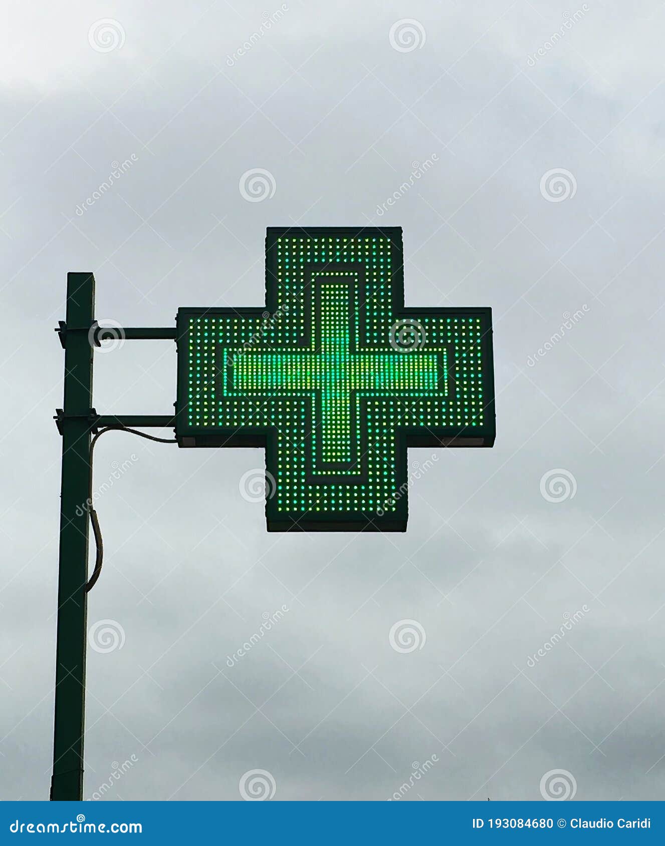 european green cross pharmacy store sign: farmacia. pharmacy sign.