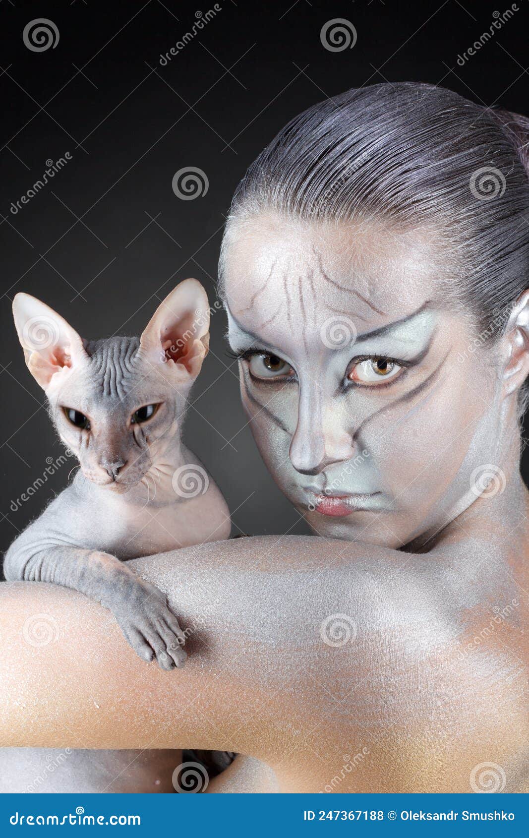 european model in cat make-up and bodyart