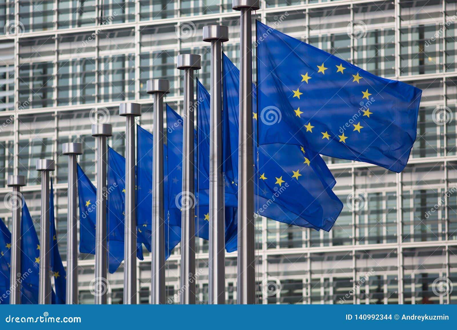european union flags in front of berlaymont building, brussels, belgium