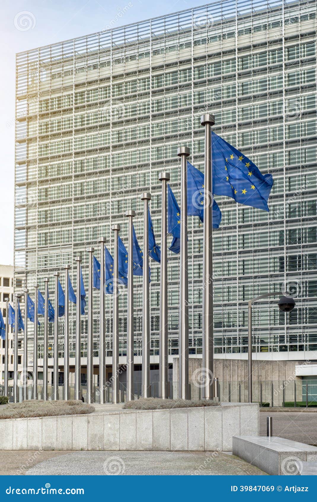 european union flags in front of the berlaymont