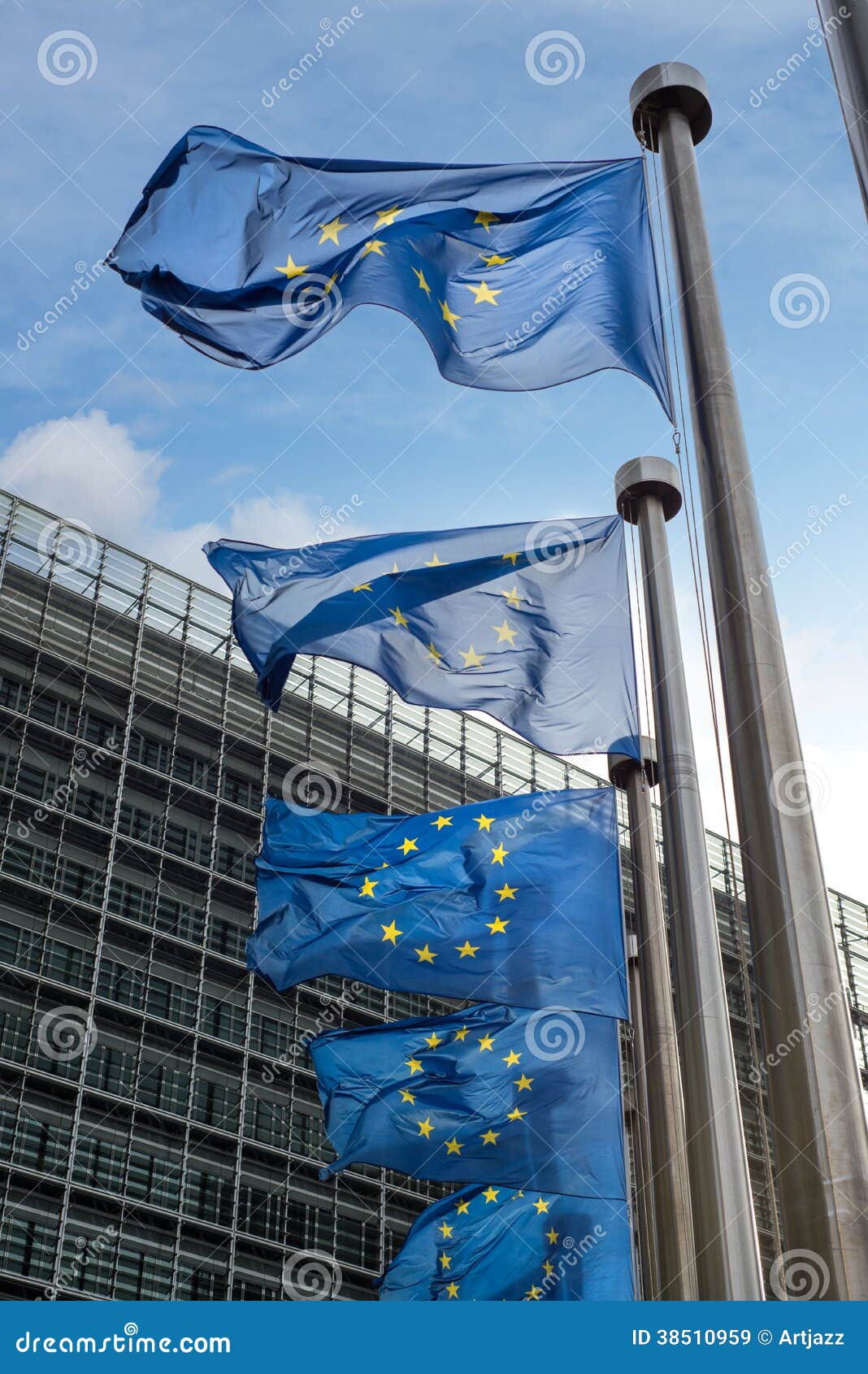 european union flags in front of the berlaymont building (european commission) in brussels, belgium.