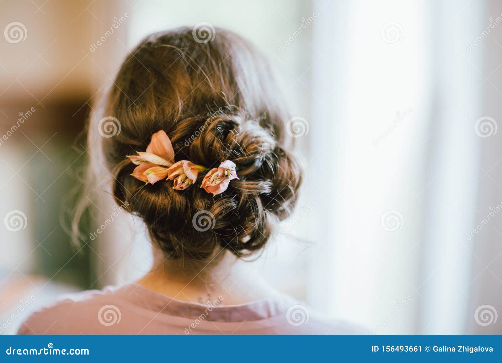 Hairstyle braid with fresh flowers tutorial Stock Photo by ©AlterPhoto  107567998