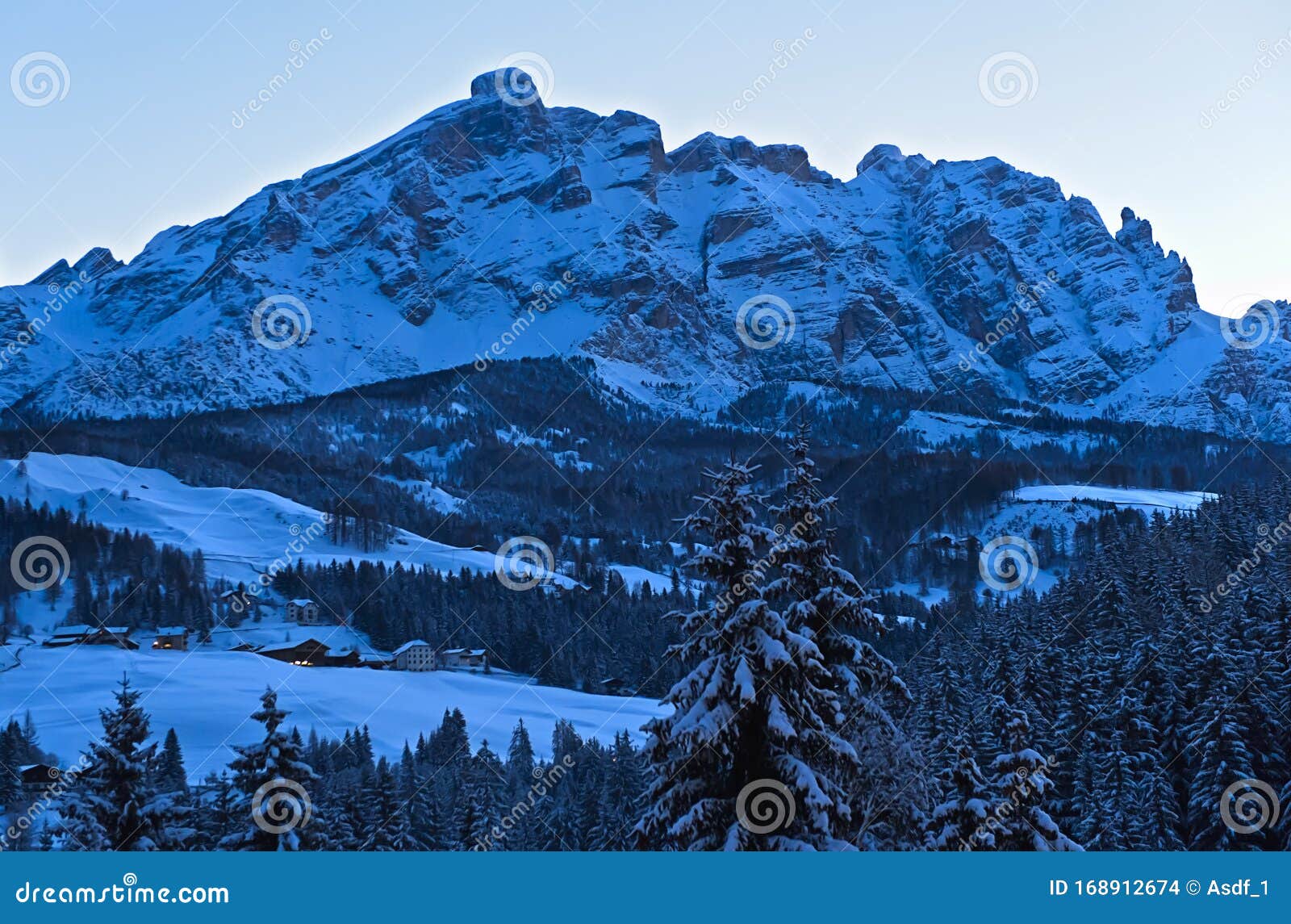 evening shadows on a cold winter day in the dolomites mountains
