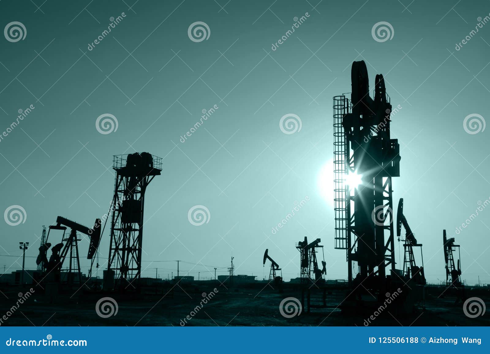 The Silhouette Of Oilfield Derrick Stock Photo - Download 