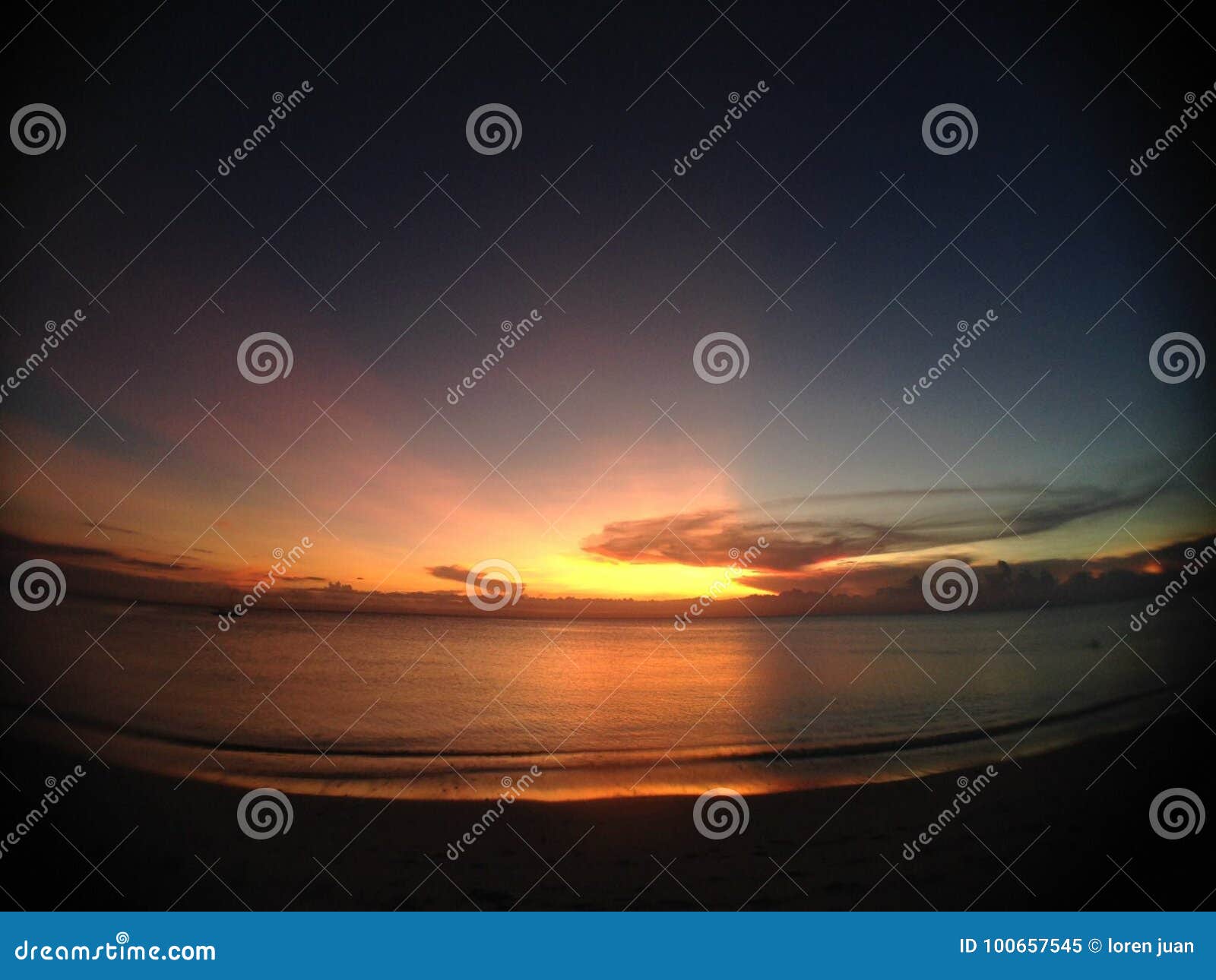 Sunset by the sea stock image. Image of sunset, sunrise 100657545