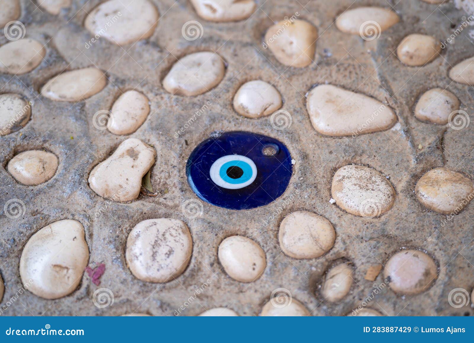 Evil Eye Bead Decor on the Paving Stone Stock Image Image of design