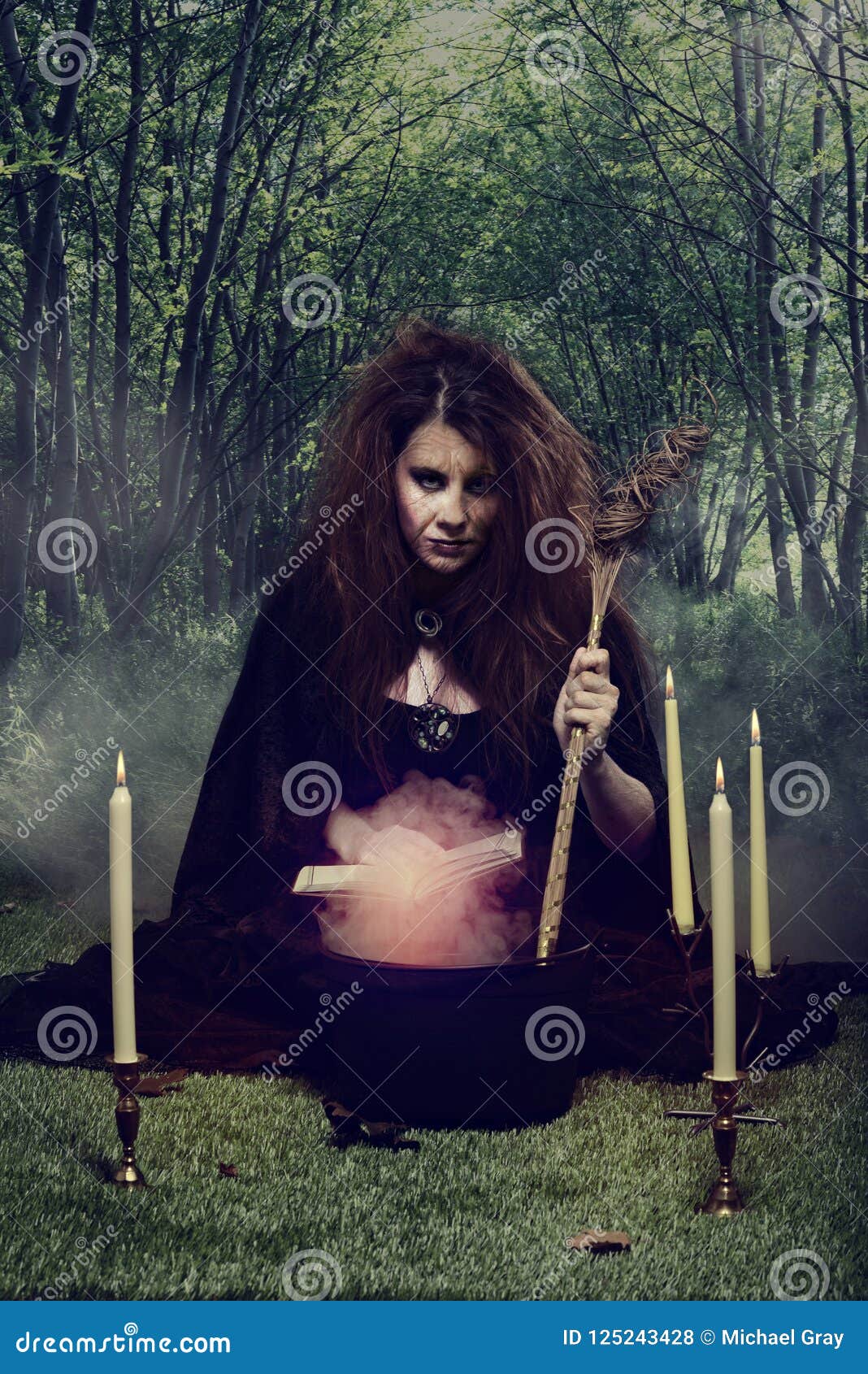 Evil Witch Stirring Her Magic Potion in a Cauldron Stock Photo Image