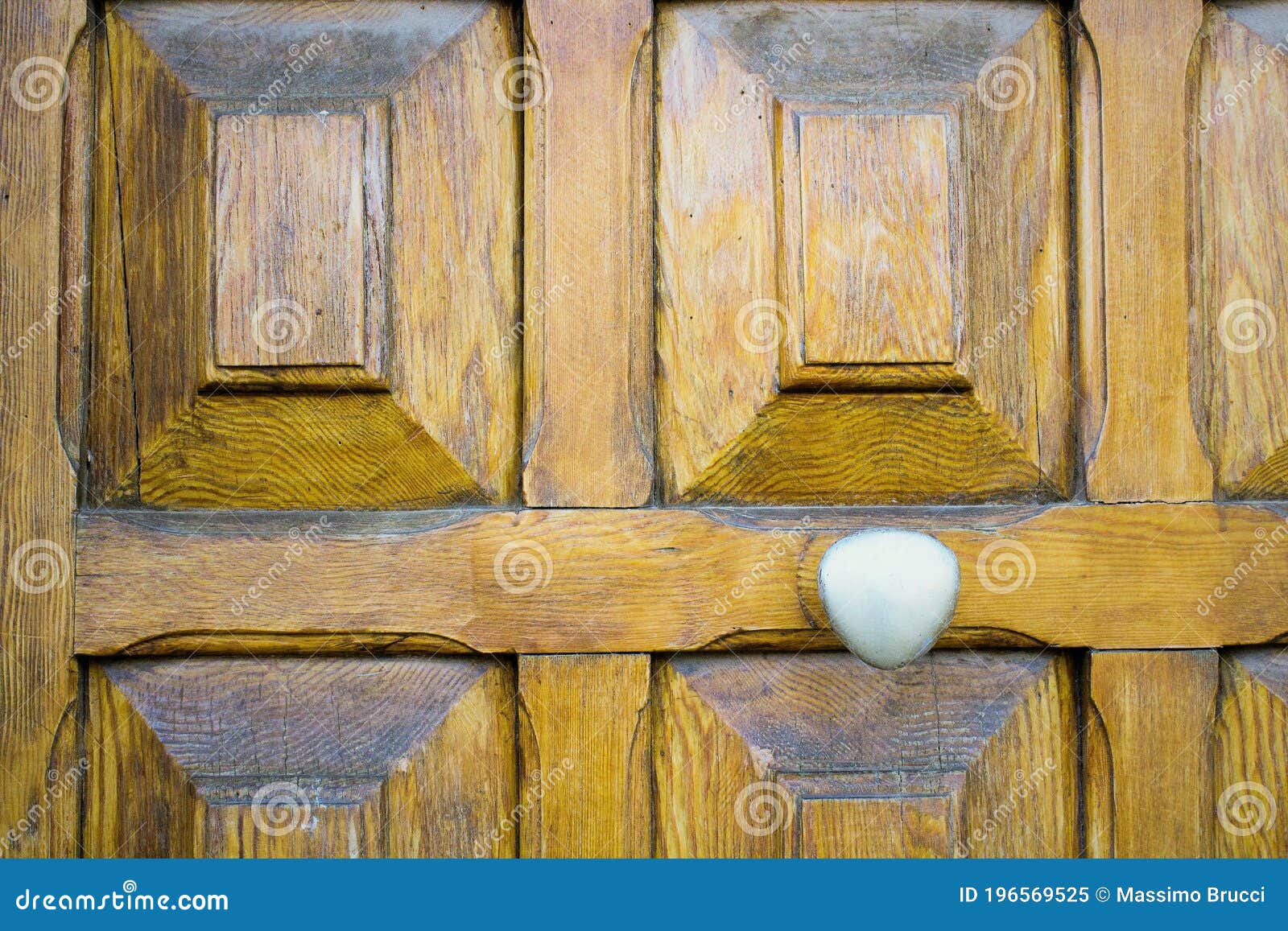 old wooden entrance door with handle