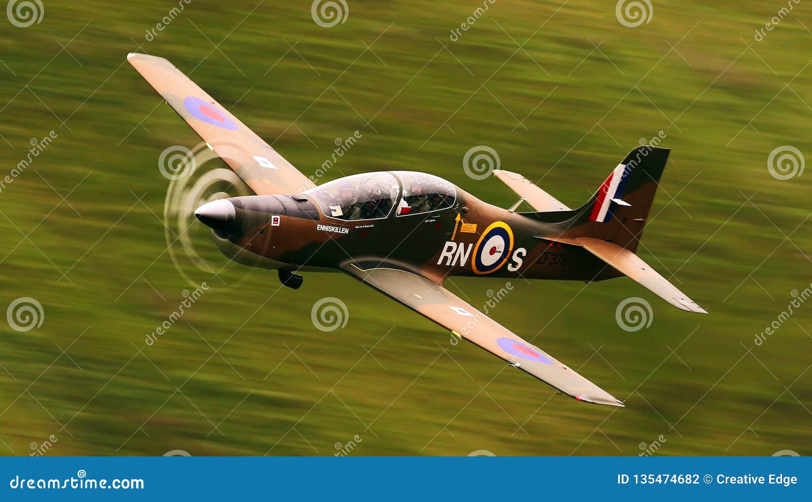 An ExRAF Spitfire Performs a High Energy Display Over the Airfield