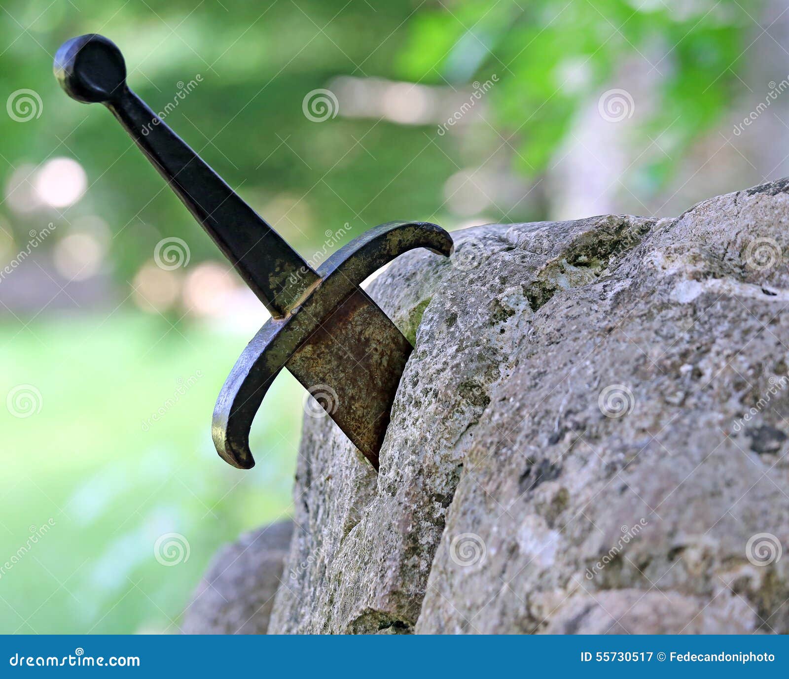Excalibur The Famous Sword In The Stone Of King Arthur Stock Photo