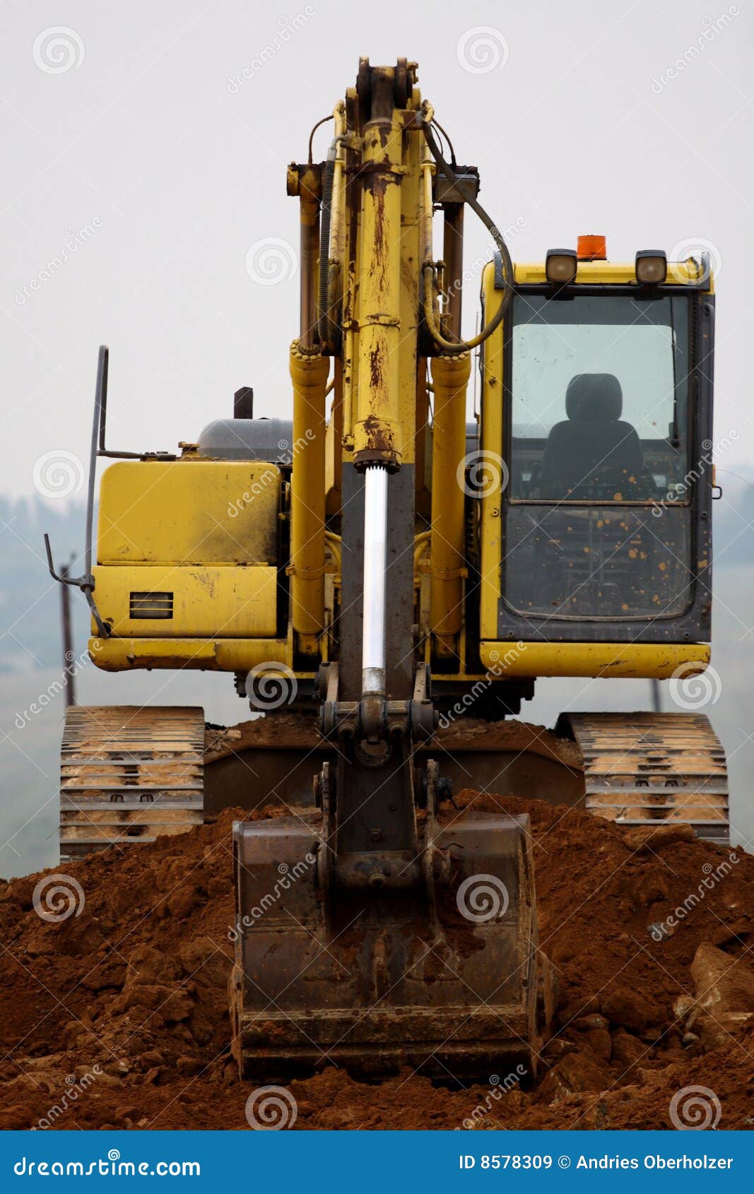 Excavator Digging Up Some Ground and Rocks Stock Image Image of earth