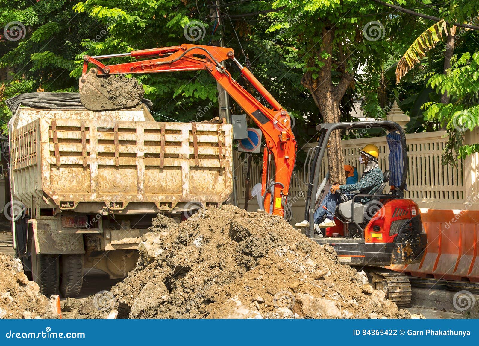 Excavator Loader Driver Working in Construction Area. Editorial