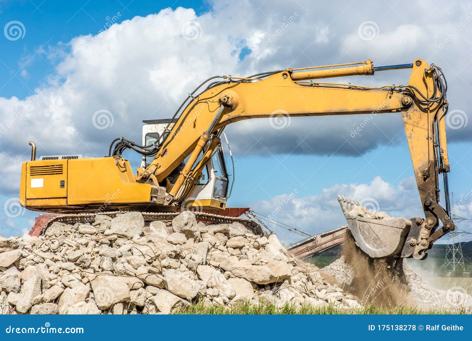 Excavator on a Construction Site while Digging Stock Photo Image of