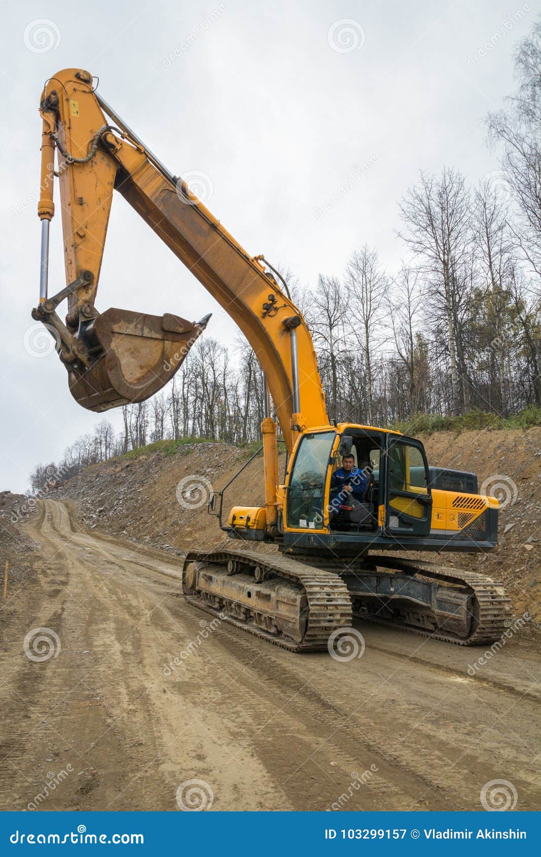 Excavator in operation editorial photography. Image of rocky 103299157