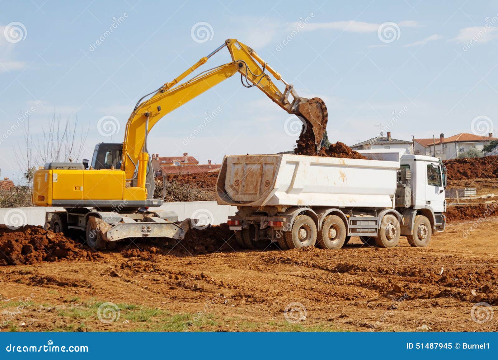 Excavator and tipper truck stock image. Image of unloading 51487945