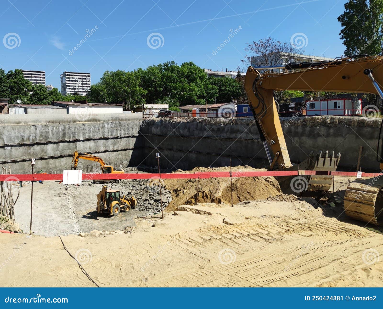 Excavators are Digging a Foundation Pit for a Large Building Stock ...