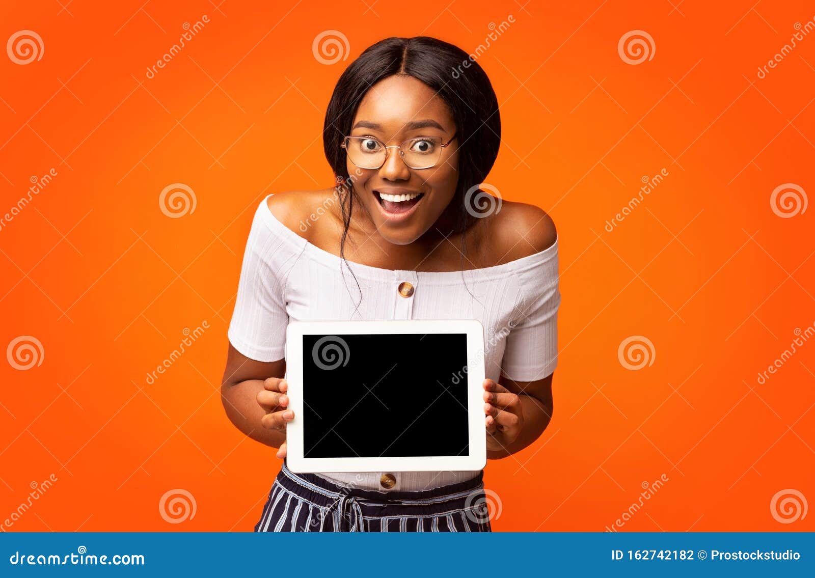 Download Excited African American Woman Showing Tablet Screen ...