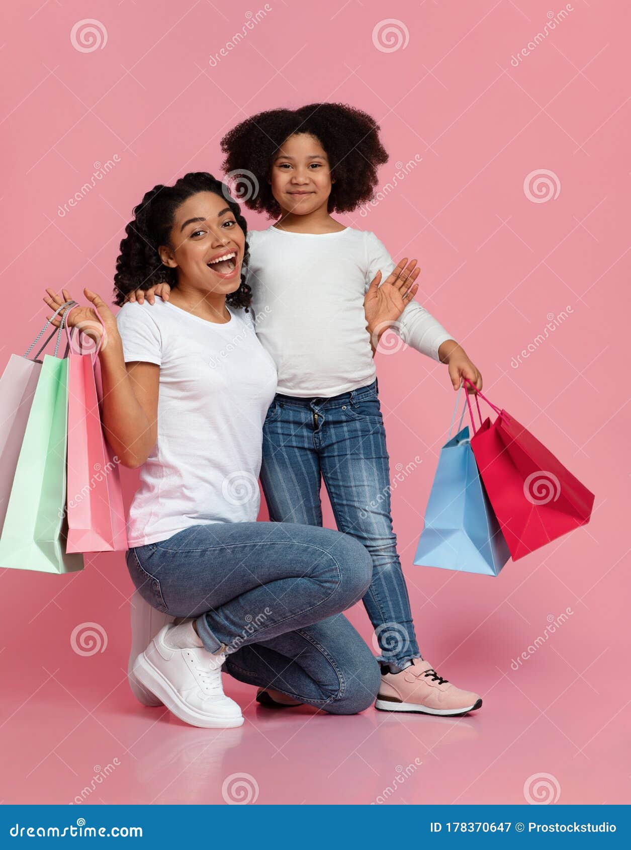 Excited Afro-American Mom and Her Little Daughter Posing with Shopping ...