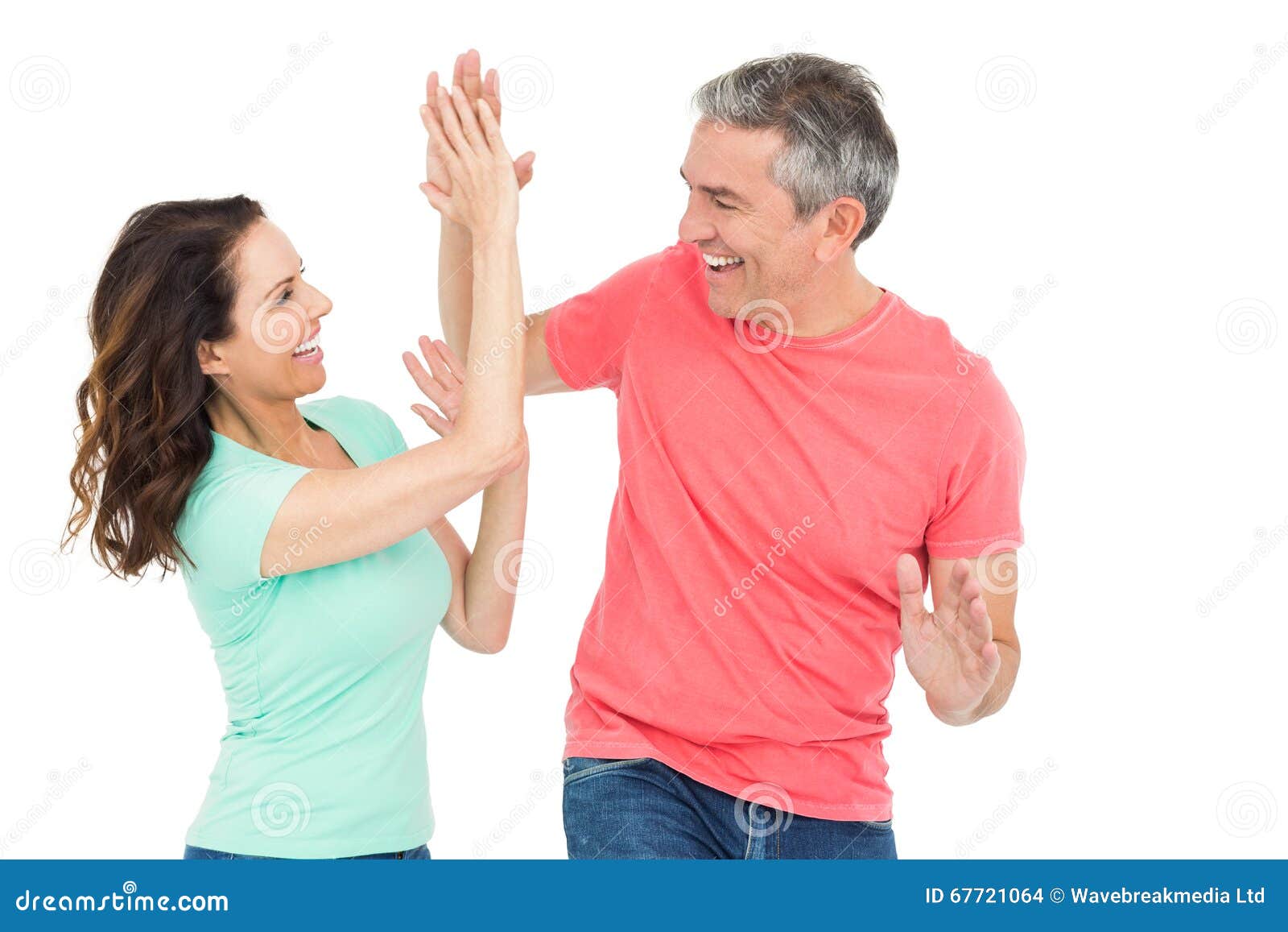 excited couple giving a high-five