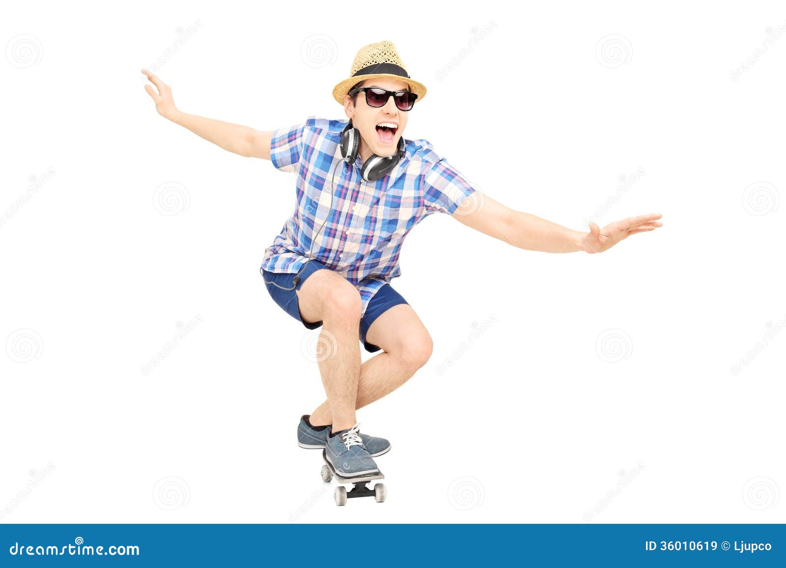 Excited Guy with Cap and Sunglasses Skating on a Skate Board Stock