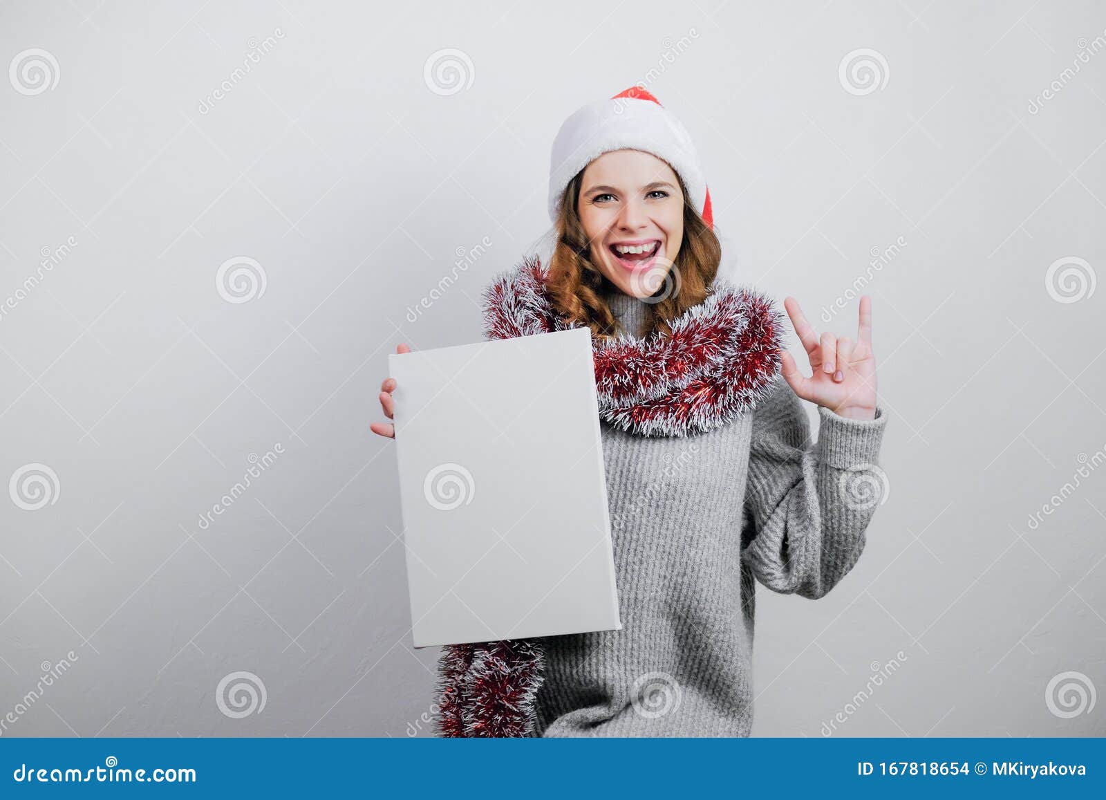 Download Excited Happy Girl In Santa Hat With Canvas Board. Mockup ...