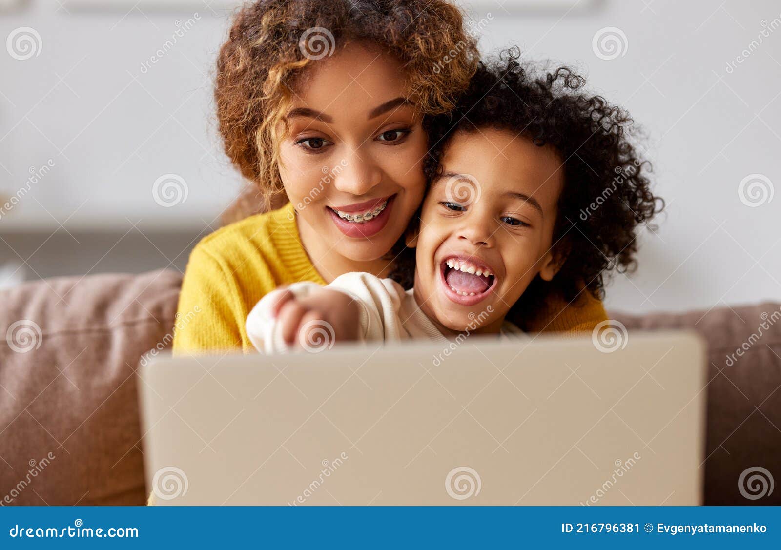 Happy Afro American Family Mother and Son Watching Funny Videos on Laptop while Relaxing in Living Room at Home Stock Image - Image of cartoons, excited: 216796381 Happy Afro American Family Mother and Son Watching Funny Videos on Laptop while Relaxing in Living Room at Home Stock Image - Image of cartoons, excited: 216796381