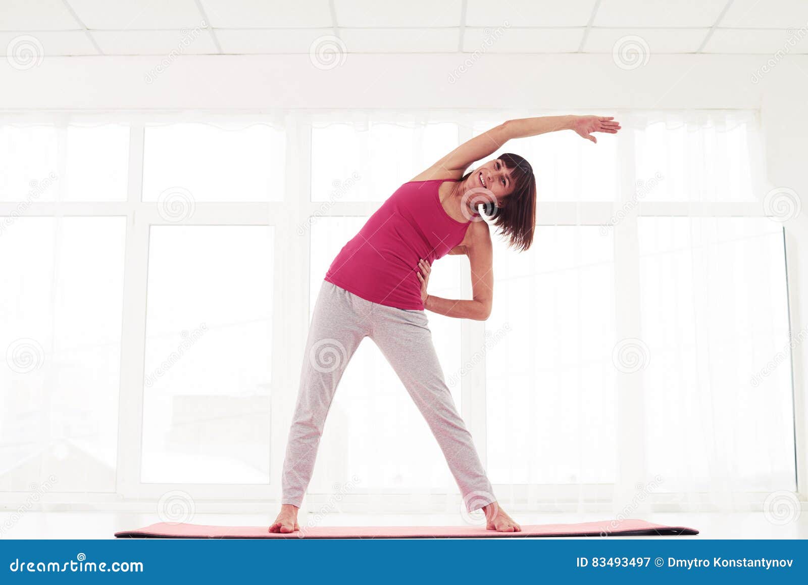 Excited Model Standing Side Stretch in the Gym Stock Image - Image of club,  physical: 83493497