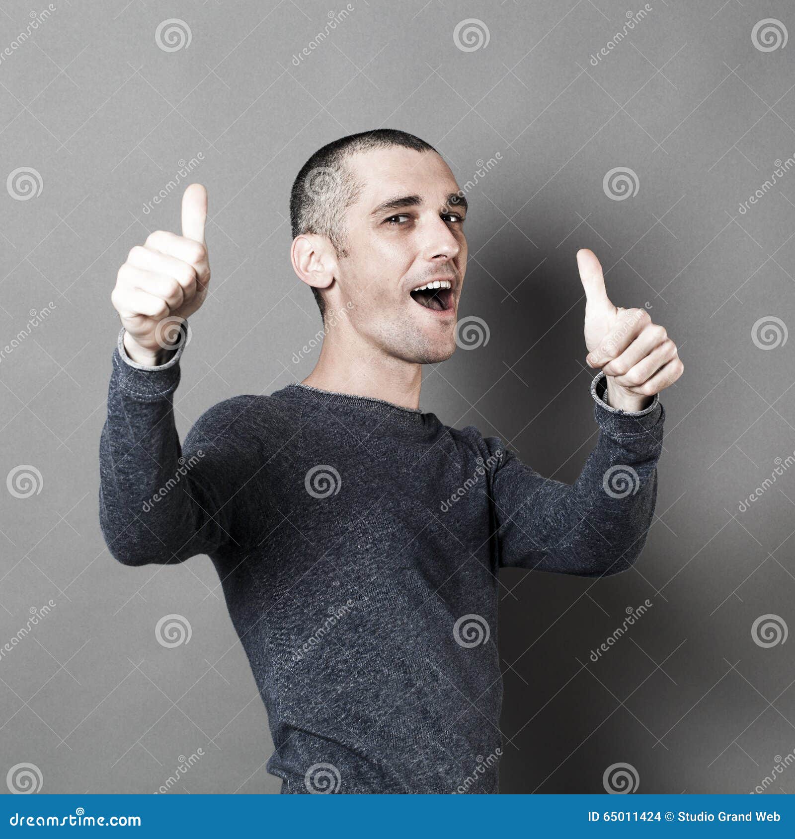 excited 30s man with thumbs up for success