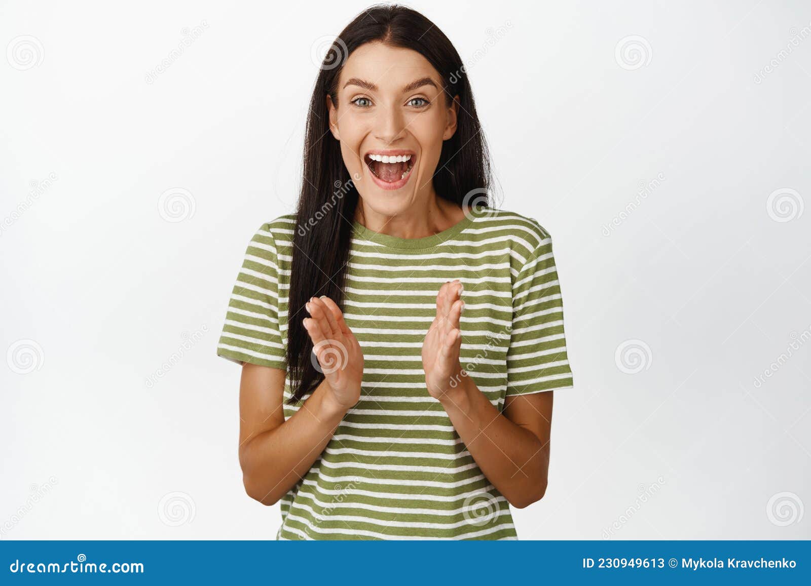 Excited Smiling Woman Clap Hands Looking Fascinated And Applausing Standing In T Shirt Over