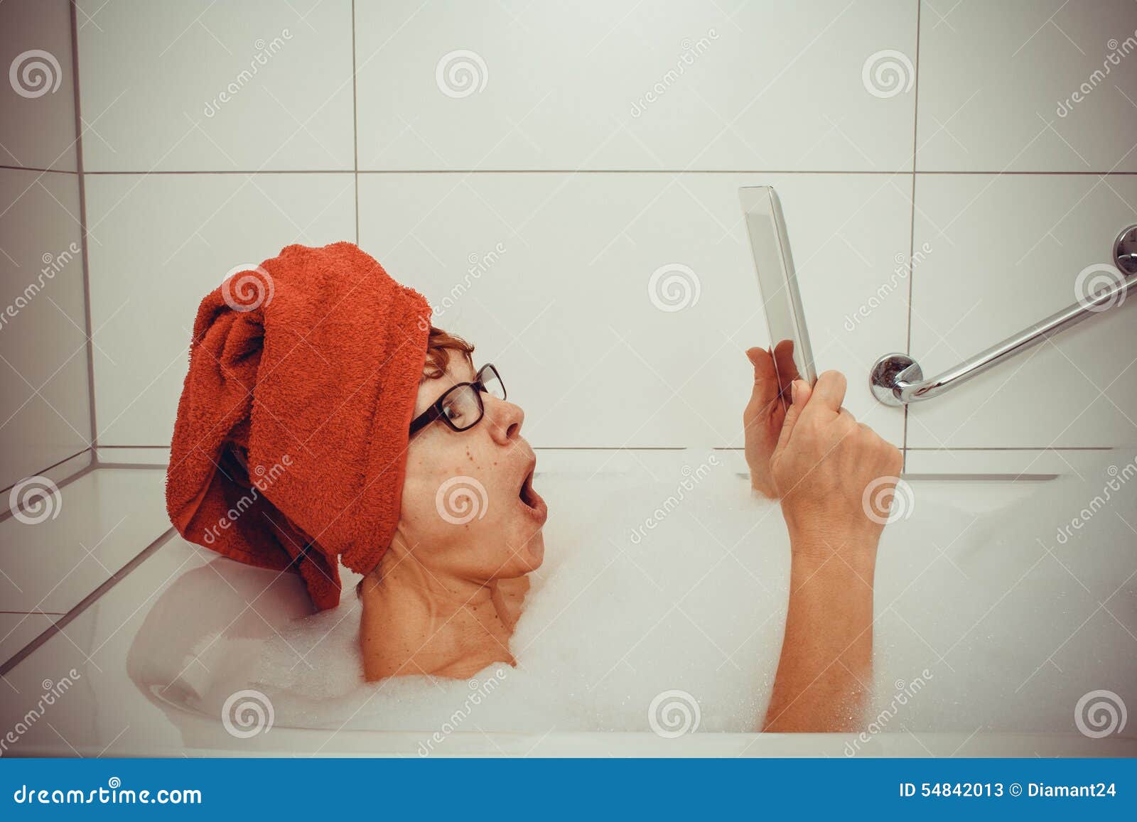 Excited Woman in Bathtub with Tablet Computers Stock Image Image of