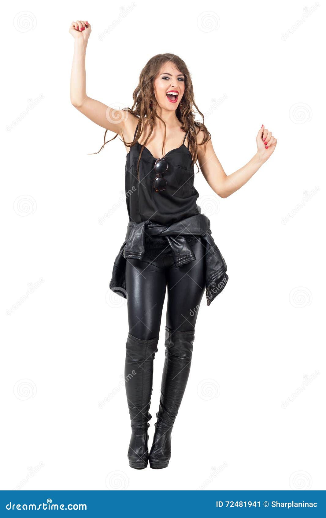 Excited Woman in Black Leather Clothes with Arms Raised Up Stock Image ...