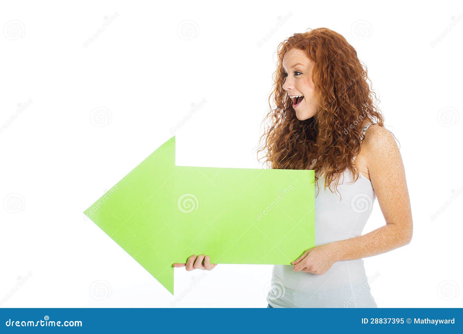 Excited Woman Holding An Arrow Pointing Left Royalty Free 